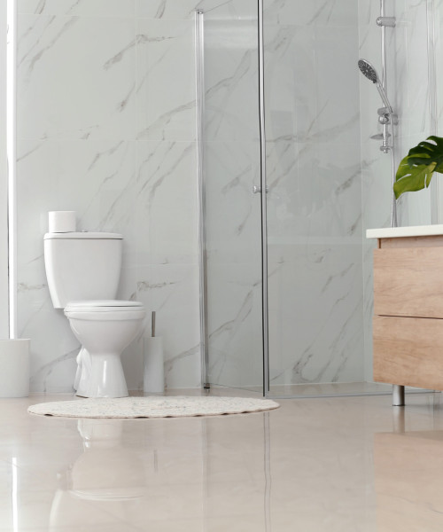 Hygienically clean toilet in a bright bathroom